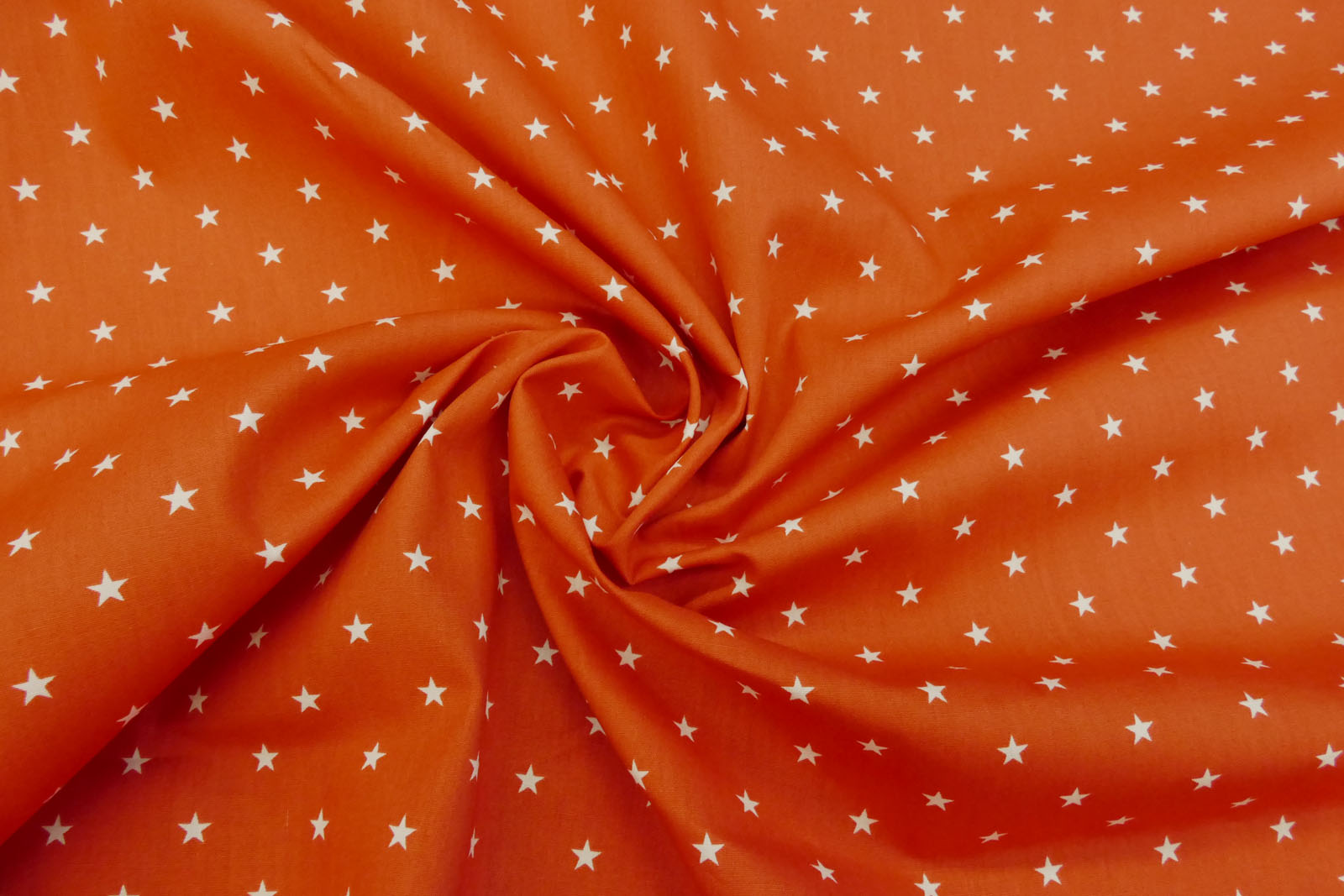 Baumwollpopeline Sterne rostorange